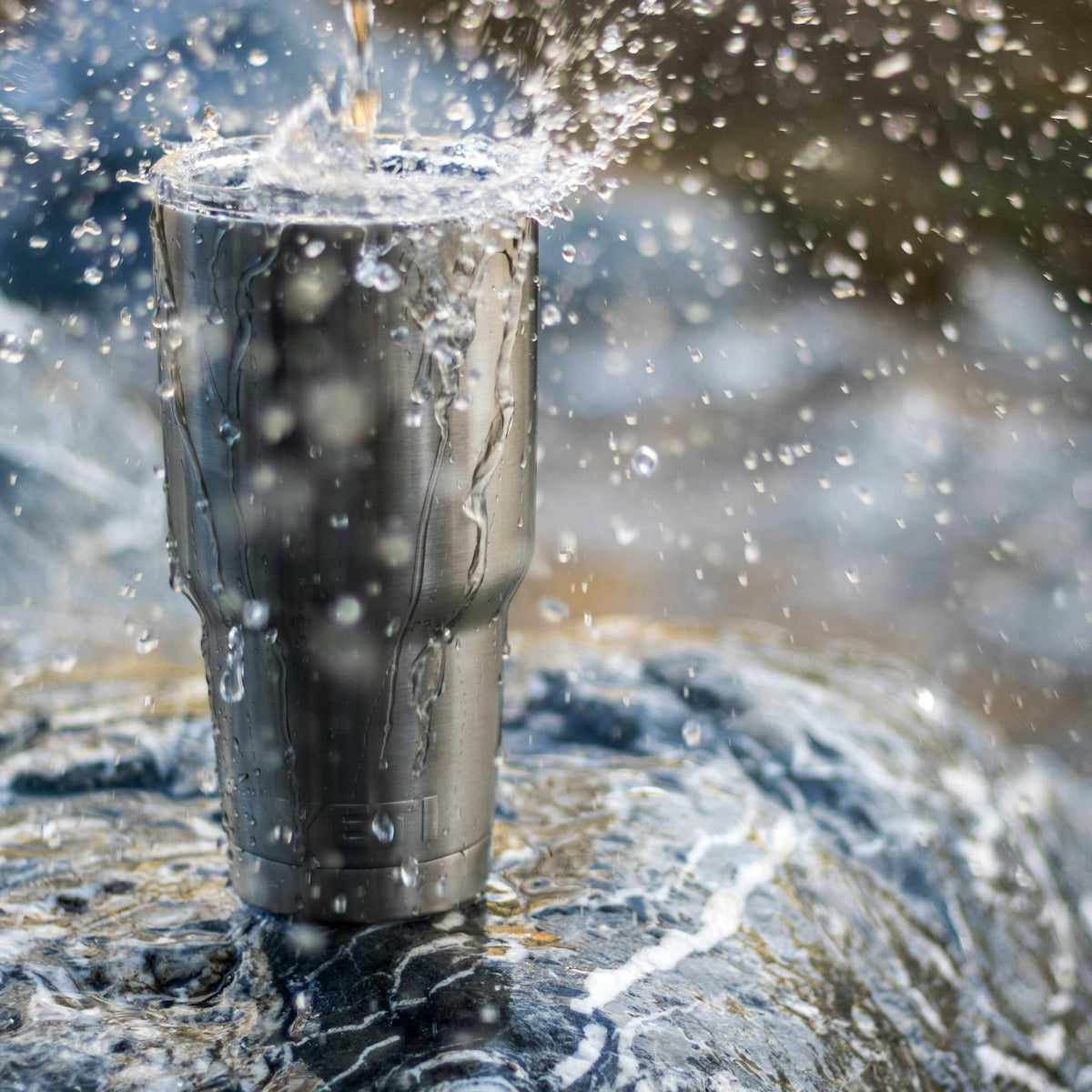 water drops on travel mug